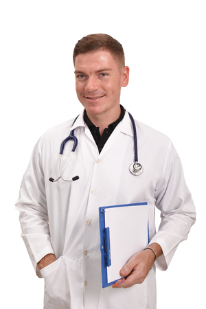 Portrait of young male doctor working on white backgroundの写真素材