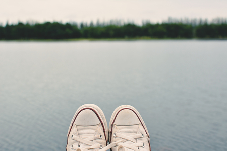 feet of hipster women and nature background, Relax time on holidayの写真素材