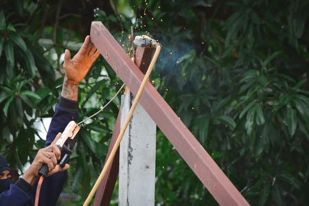 Close up man at work build a houseの写真素材