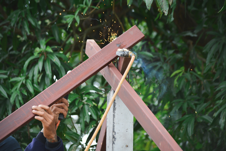 Close up man at work build a houseの写真素材