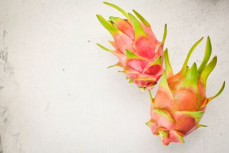 Fresh dragon fruit on tableの写真素材