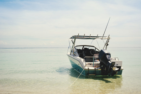 speedboat on the beach wait a trip to islandの写真素材