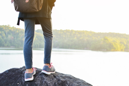 Asian girl backpack in nature winter season, Relax time on holiday concept travel,selective and soft focus,tone of hipster styleの写真素材