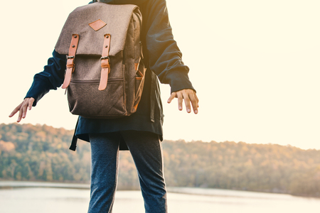 Asian girl backpack in nature winter season, Relax time on holiday concept travel,selective and soft focus,tone of hipster styleの写真素材