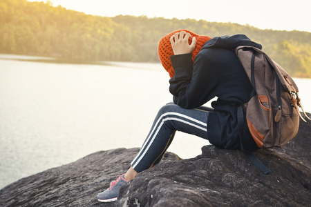 Sad girl backpack in nature winter season, selective and soft focus,tone of hipster styleの写真素材