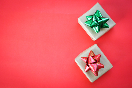 Gift box on red background for Christmas conceptの写真素材