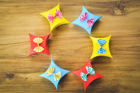 Colorful gift box paper on brown wood, Christmas and New year concept,selective and soft focusの写真素材
