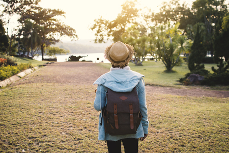 Happy hipster old women backpack traveling relax time and holiday, color vintage style selective and soft focusの写真素材
