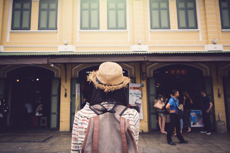 Asian women backpacker relax time on vacation hipster lifestyle, color style vintage toneの写真素材