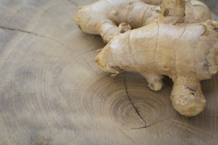 Ginger on wood backgroundの写真素材