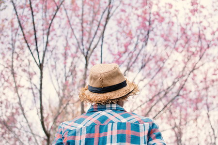 Asian tourist in nature , Relax time on holiday concept travel,selective and soft focus,tone of hipster styleの写真素材