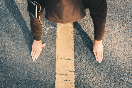 Man warm up before running on the road for health, color of hipster tone selective and soft focusの写真素材