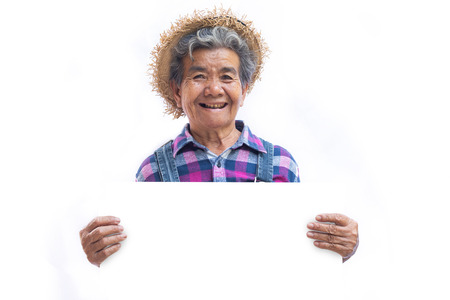 Happy old Asian gardener on a white backgroundの写真素材