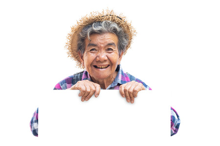 Happy old Asian gardener on a white backgroundの写真素材