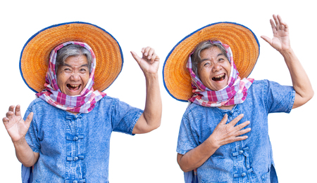 Happy old women farmer smiling and joyful on a white backgroundの写真素材