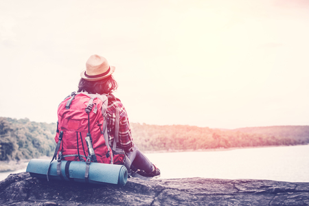 Happy Asian woman relaxing on holiday  travel concept,selective and soft focus,tone of hipster styleの写真素材