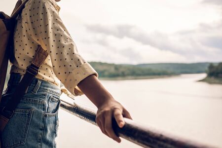 Asian girl backpack on the park background, journey and traveling on holiday concept.の写真素材