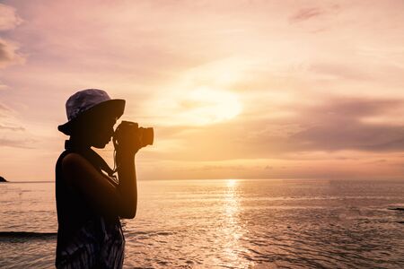 A girl resting on the sea and holiday tho travel concept.の写真素材