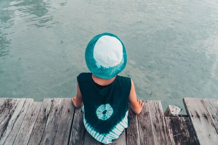 A girl resting on the sea and holiday tho travel concept.の写真素材