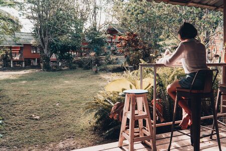 Cute girl reading a book, hobby and resting concept.の写真素材