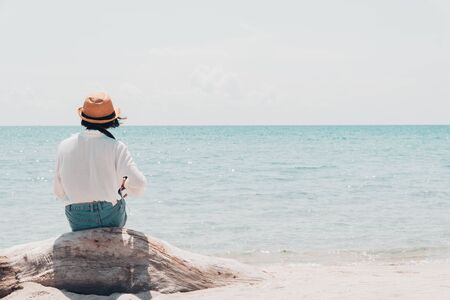 The tourist shooting in the sea on a beautiful day.の写真素材