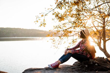 Asian girl resting and relax in the park on holiday.の写真素材