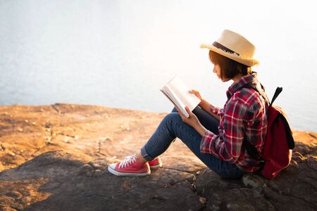 Cute girl reading a book .の写真素材
