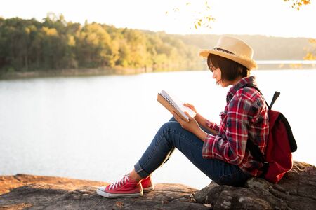 Cute girl reading a book .の写真素材
