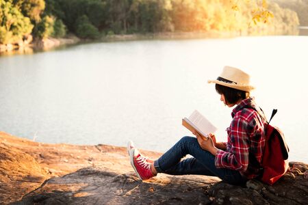 Cute girl reading a book .の写真素材