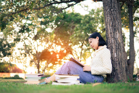 Asian female high school happy using tablet e leaning online class. selective and soft focus.の写真素材