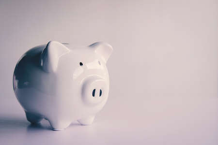 piggy bank on the table saves money concept.の写真素材