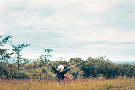Happy women backpack and enjoying with the beautiful nature relaxing on weekend.の写真素材