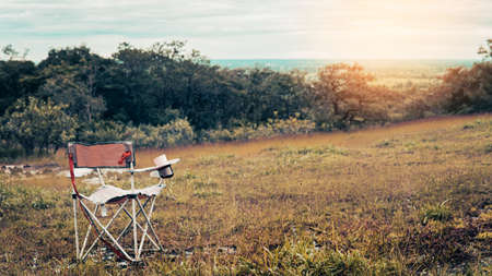 Camping chair enjoying with the beautiful nature relaxing on weekend.の写真素材