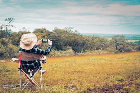 Happy women backpack and enjoying with the beautiful nature relaxing on weekend.の写真素材