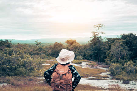 Happy women backpack and enjoying with the beautiful nature relaxing on weekend.の写真素材