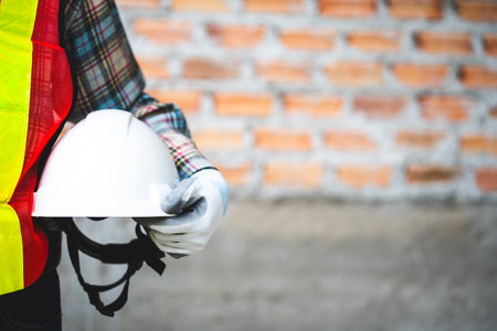 Safety first, importance of protective gear for construction workers.の写真素材