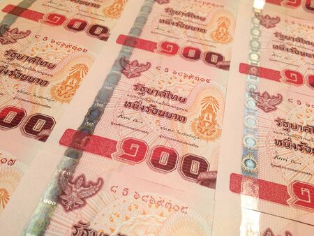 Close up of 100 baht Thai bank note. 