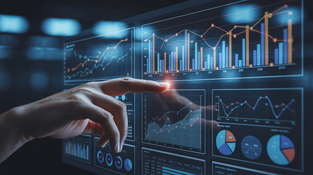 Close up of businesswoman hand touching virtual panel with graphs and diagramsの素材