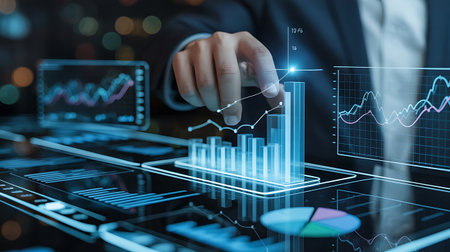 businessman working with new modern computer show business graph and candlestick chartの素材