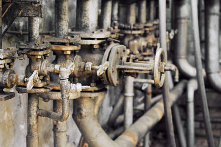 Old water pipes at the factoryの写真素材