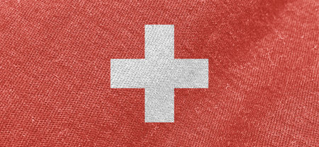 Switzerland fabric flag. Patriotic background. National flag of Switzerlandの写真素材