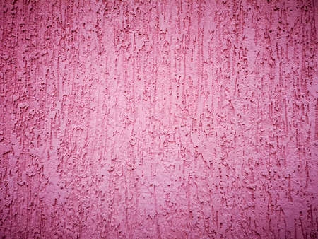 Texture and background - pink wall, smears are visible. In the form of a vignette, a place to signの写真素材