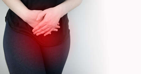 A woman suffers from pain in the pelvic organs. The gynecologist examines the patient. Painful...