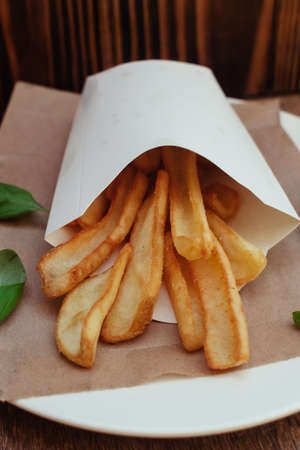 Top view of French fries. Fry dip. The concept of fast food, quick bites and restaurants for...