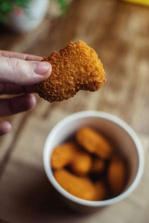 Close-up of chicken nuggets Fast food in batter. Meal preparation restaurants and cafes. Classic American cuisine concept.の写真素材