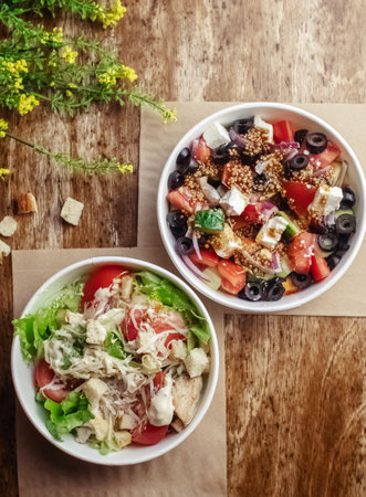 Salad in a disposable glass close-up. Healthy and fast food. Takeaway cafe. Disposable tableware for food safety. Healthy fast foodの写真素材