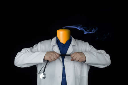 match concept. The doctor is tired from work and without strength. work burnout. psychological problems. Fatigue and stress. The concept of a work crisis and change of occupation. professional crisisの写真素材