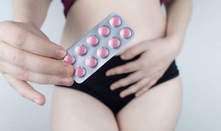 Tablets for pain during menstruation. Pain during menses. The concept of critical days for a woman....