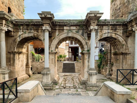 View of historical ancient monument Hadrian`s Gate Uckapilar in old city of Antalya Kaleici, Turkey. Horizontal stock imageのeditorial素材