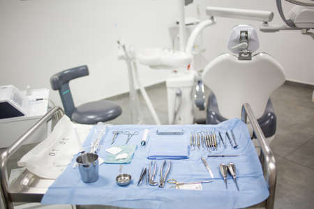 Modern dental clinic cabinet - dentist chair, equipment and tools. Dentistry, medical office.